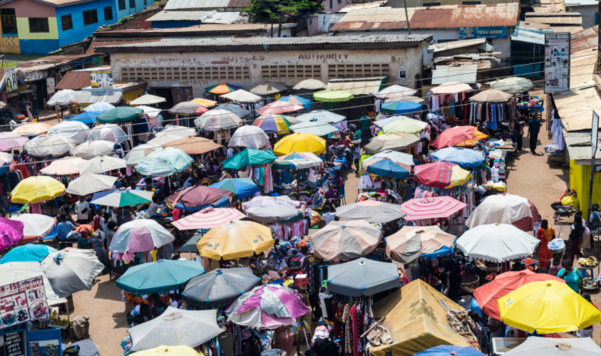 Market Intelligence in Africa – Diverse African consumers in a busy street market.